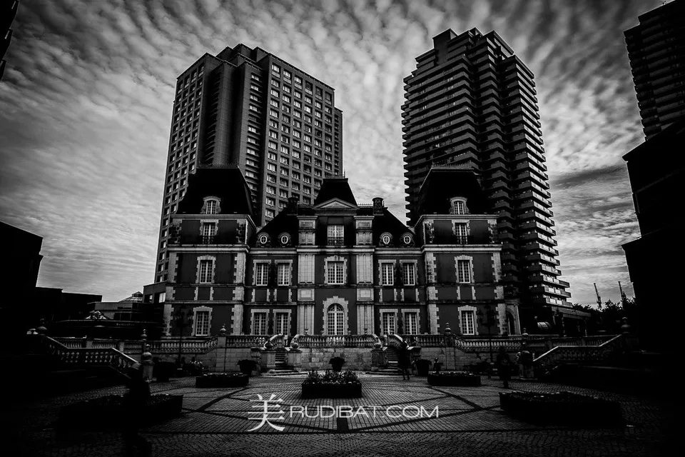 Old & New – Old style Hotel and Restaurant in Ebisu Tokyo Japan with Modern Towers behind.