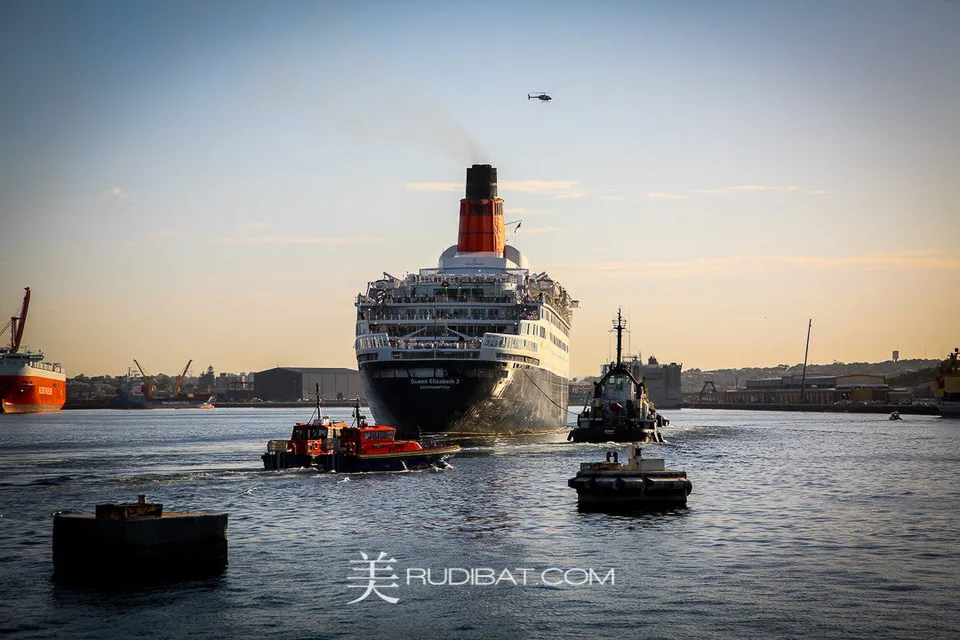 Qe2 – . Arriving into Fremantle Port on her final voyage.