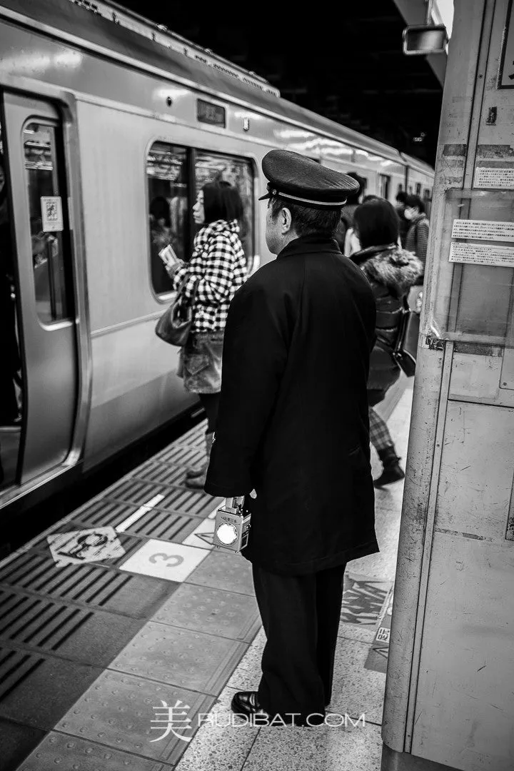 Service – JR Line Station Conductor still in 2015 Tokyo.